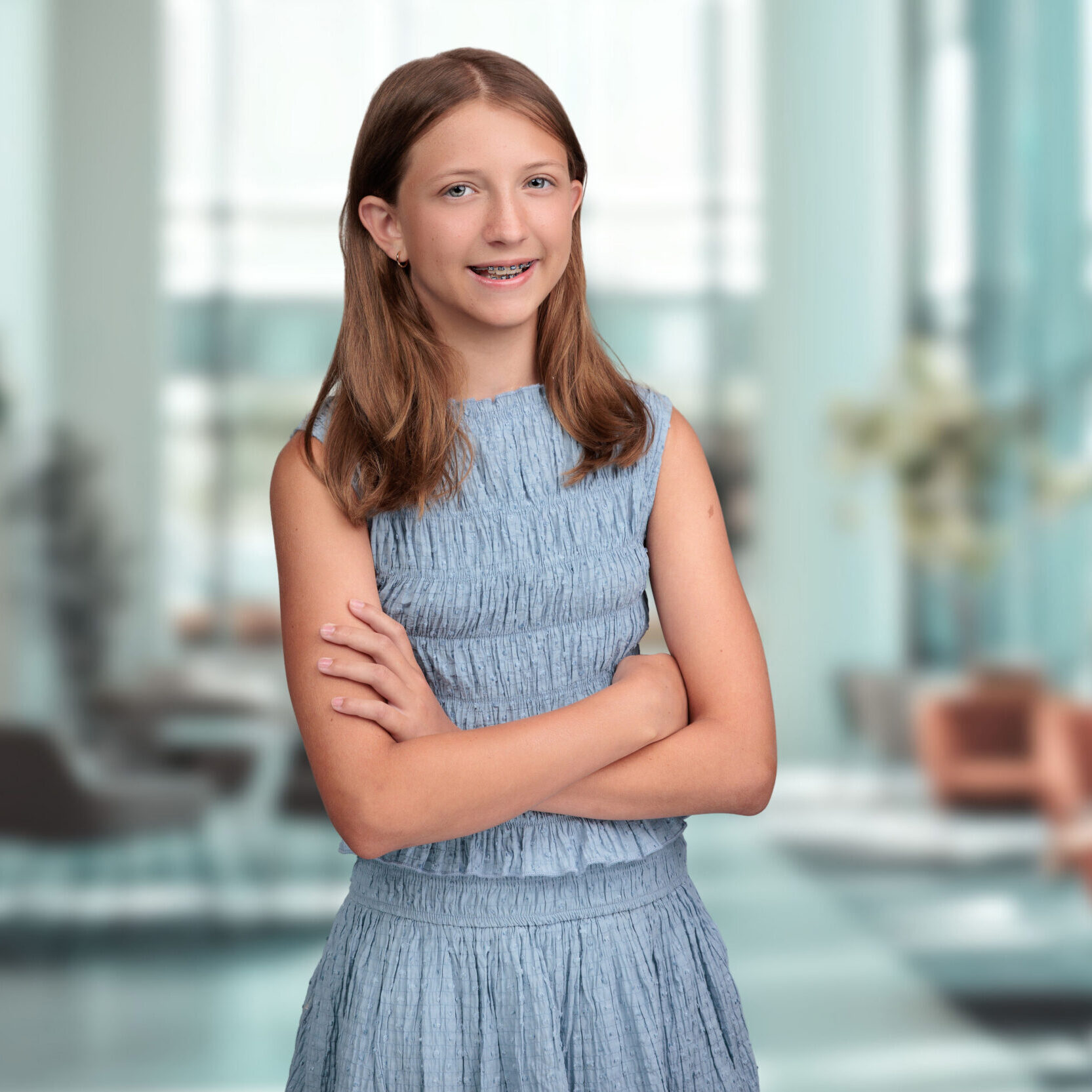 Young patient smiling with braces at Austin Orthodontics